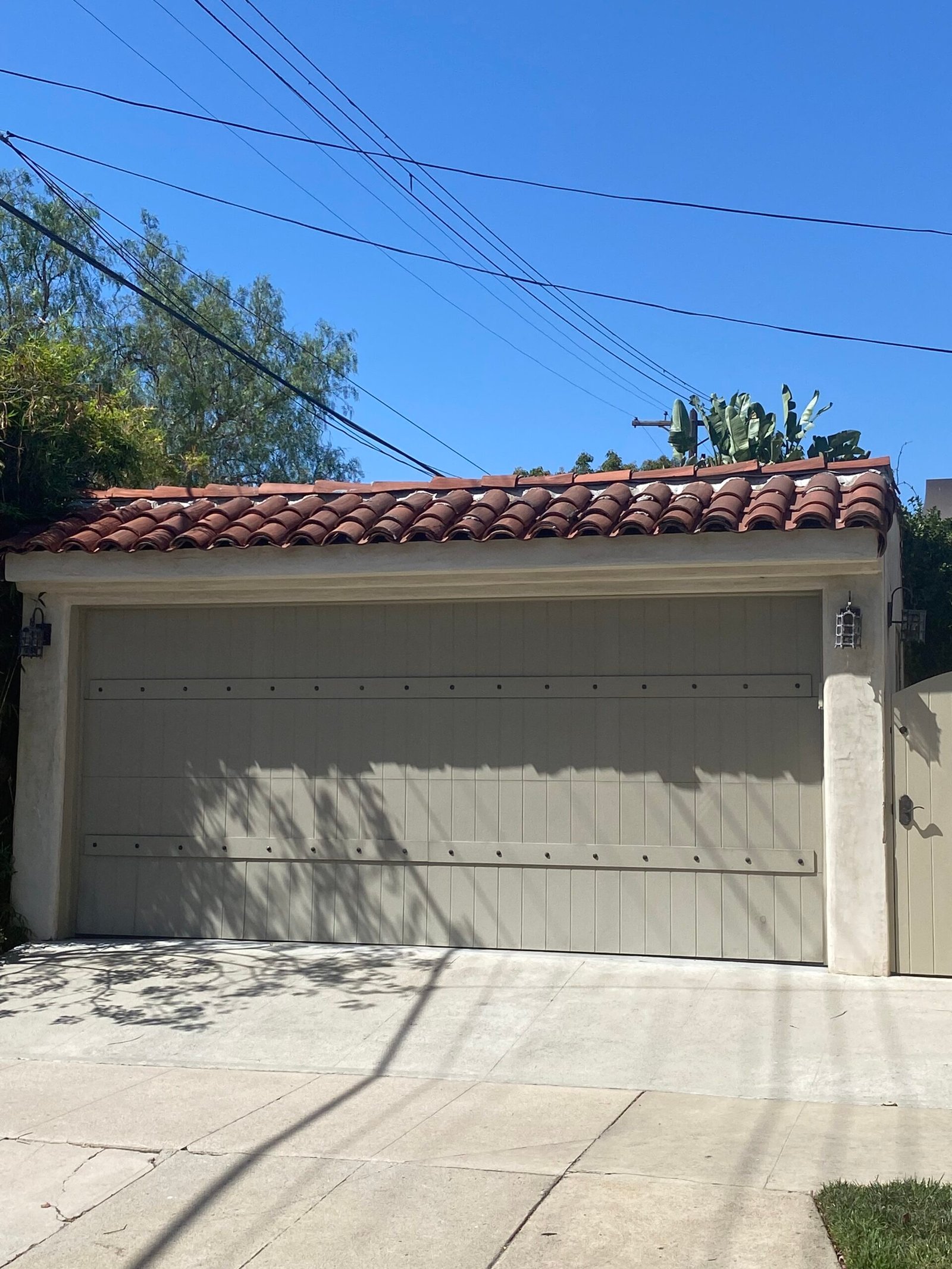 Carriage-style garage door panel replacement project in Whittier, California