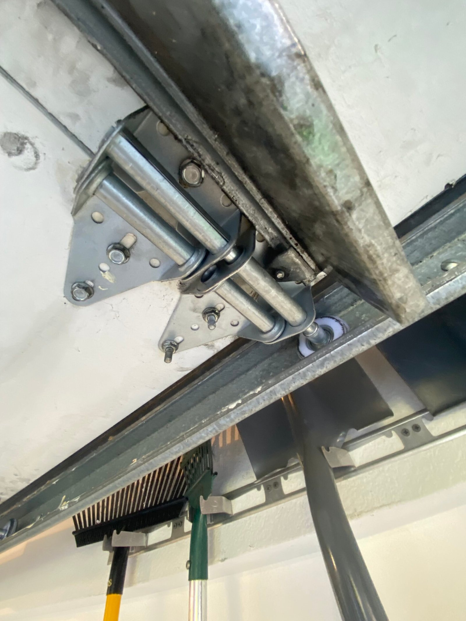 Garage door roller replacement and repair project in Whittier, California